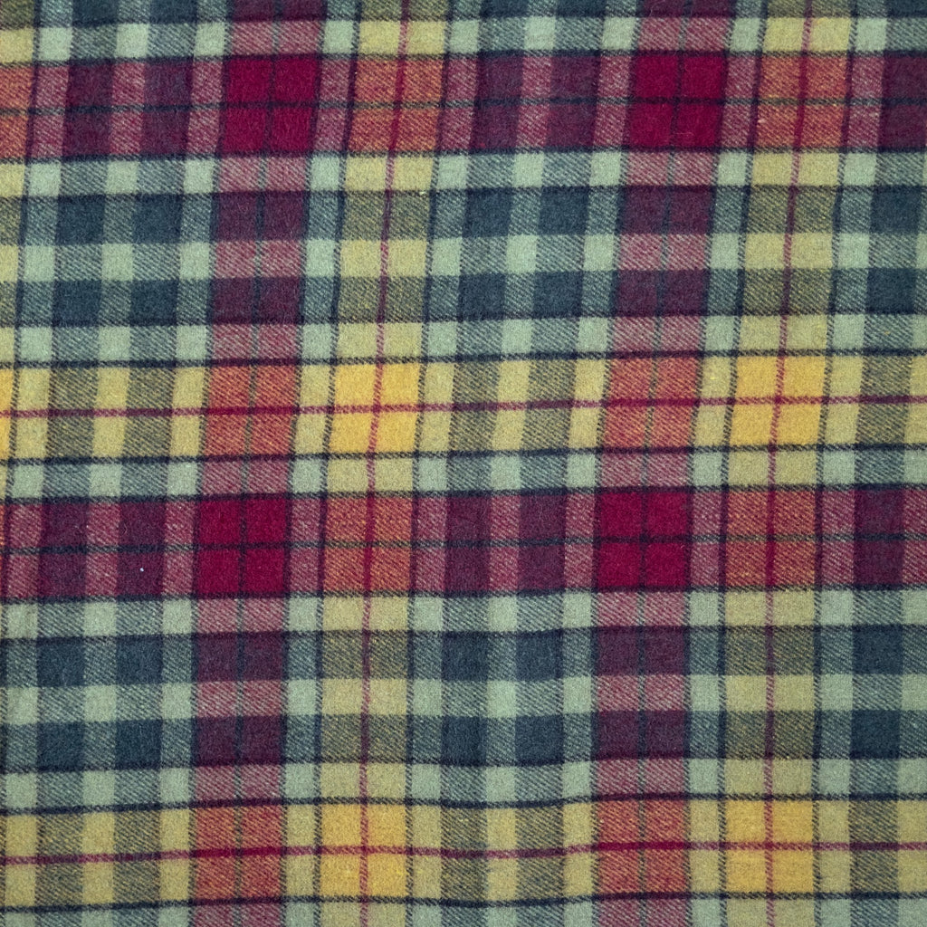 A close up example of the Autumn Buchanan tartan. The Autumn Buchanan tartan has red, yellow, green colours in a checkered pattern.