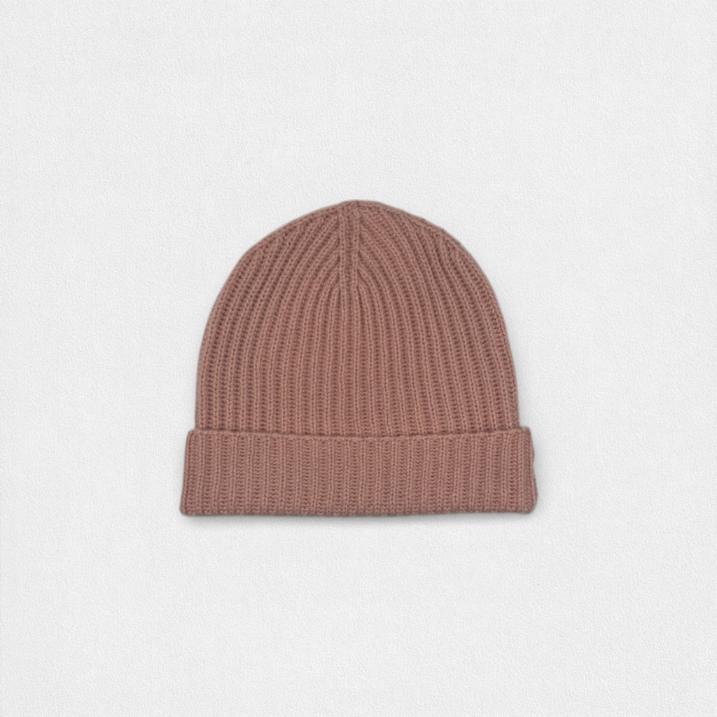Brown knit beanie on a light gray background