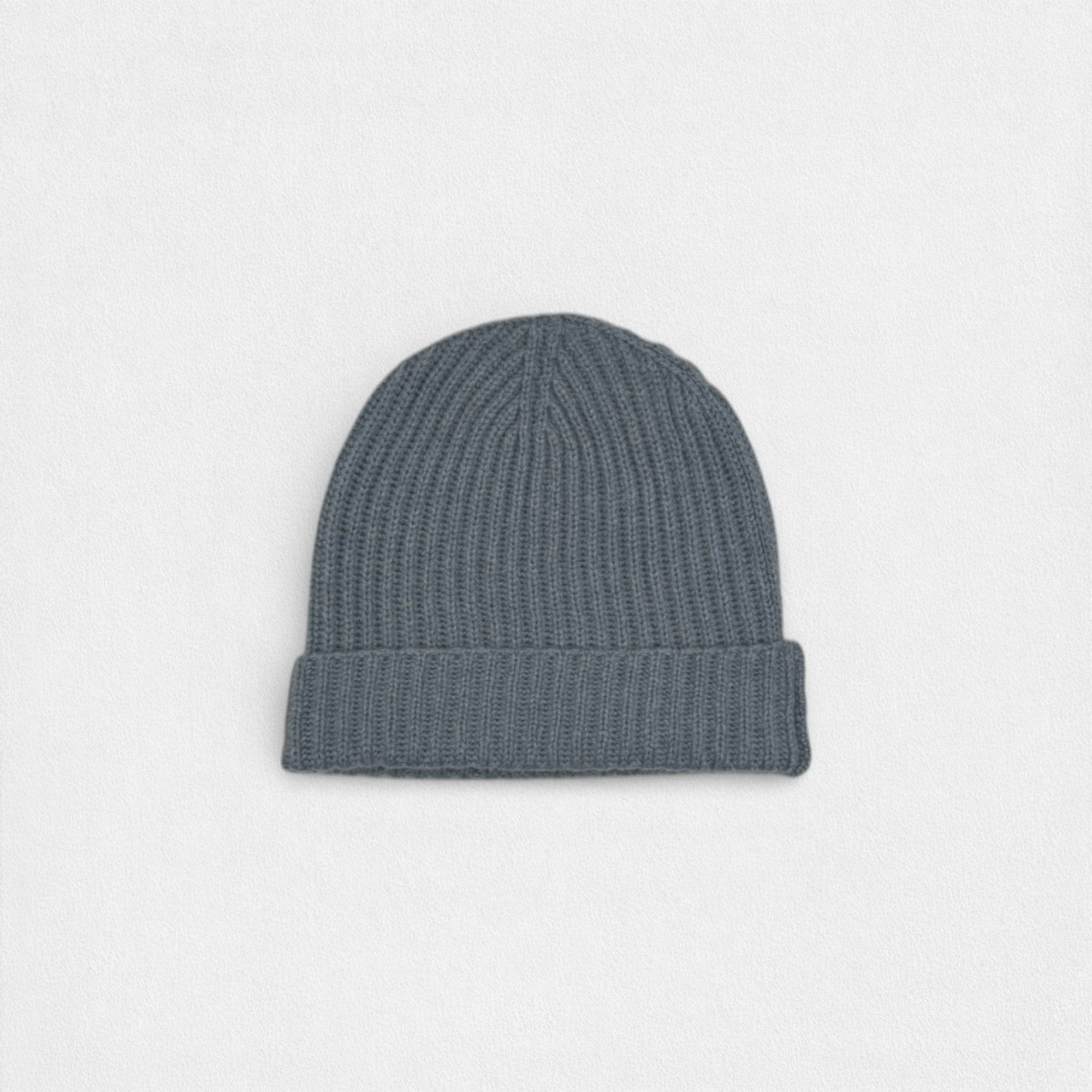 Gray knit beanie on a light gray background