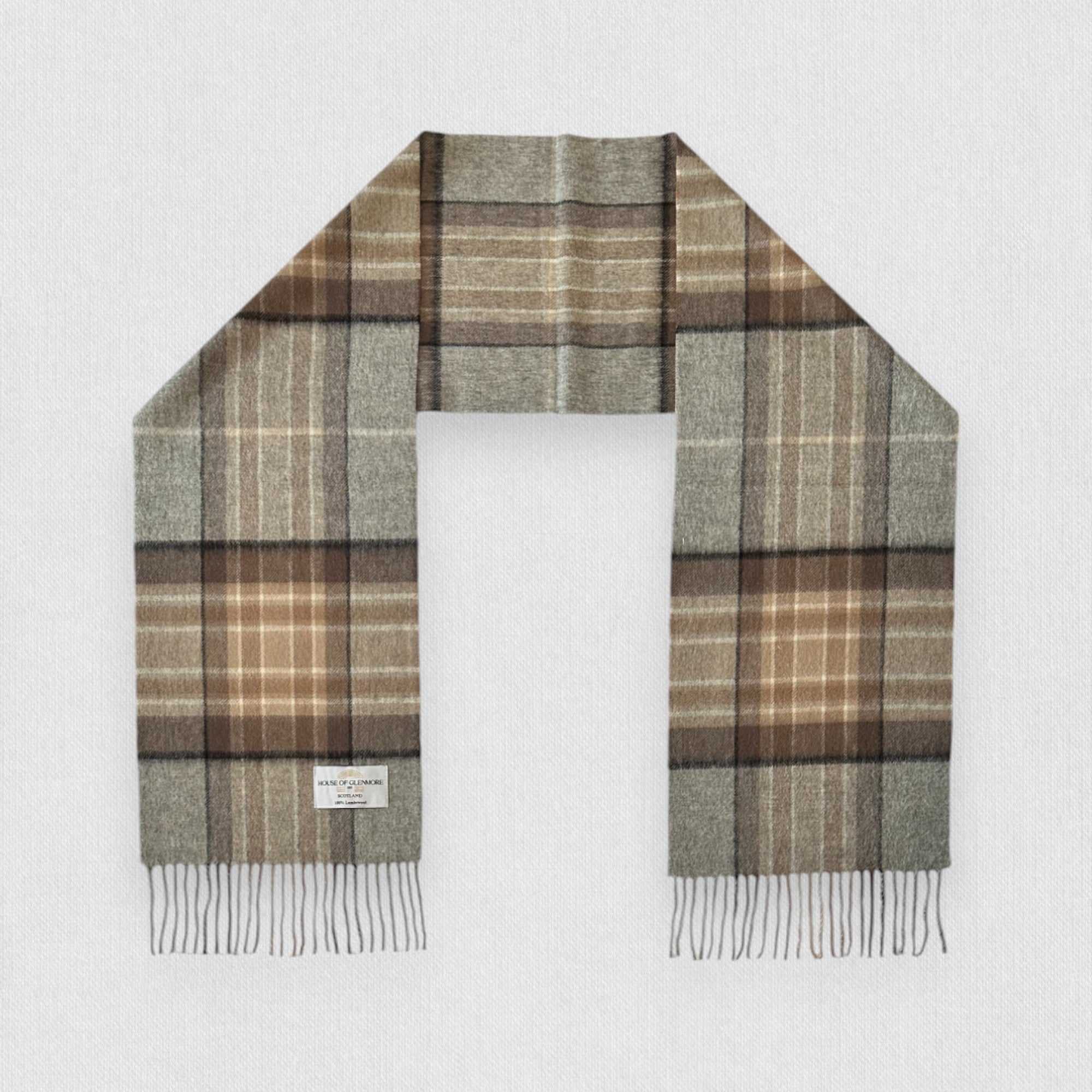 Plaid scarf with brown, green, and beige colors on a white background