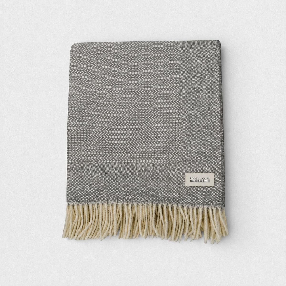 Pebble Grey 100% Lambswool Diamond Border Blanket, product photo — Loom & Cove