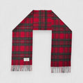 A Royal Stewart tartan scarf with red as the primary color and including green, blue, and yellow accents, displayed flat with fringes.