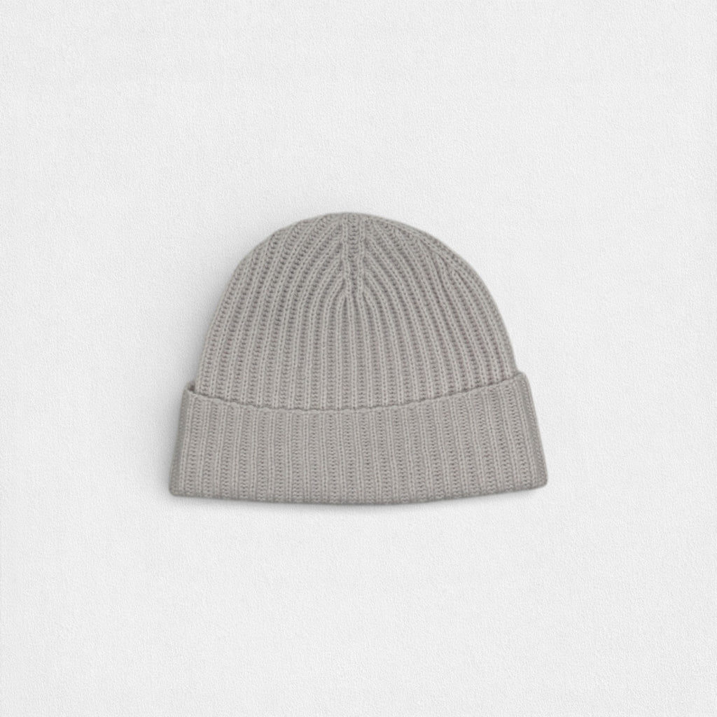 Gray knit beanie on a light gray background