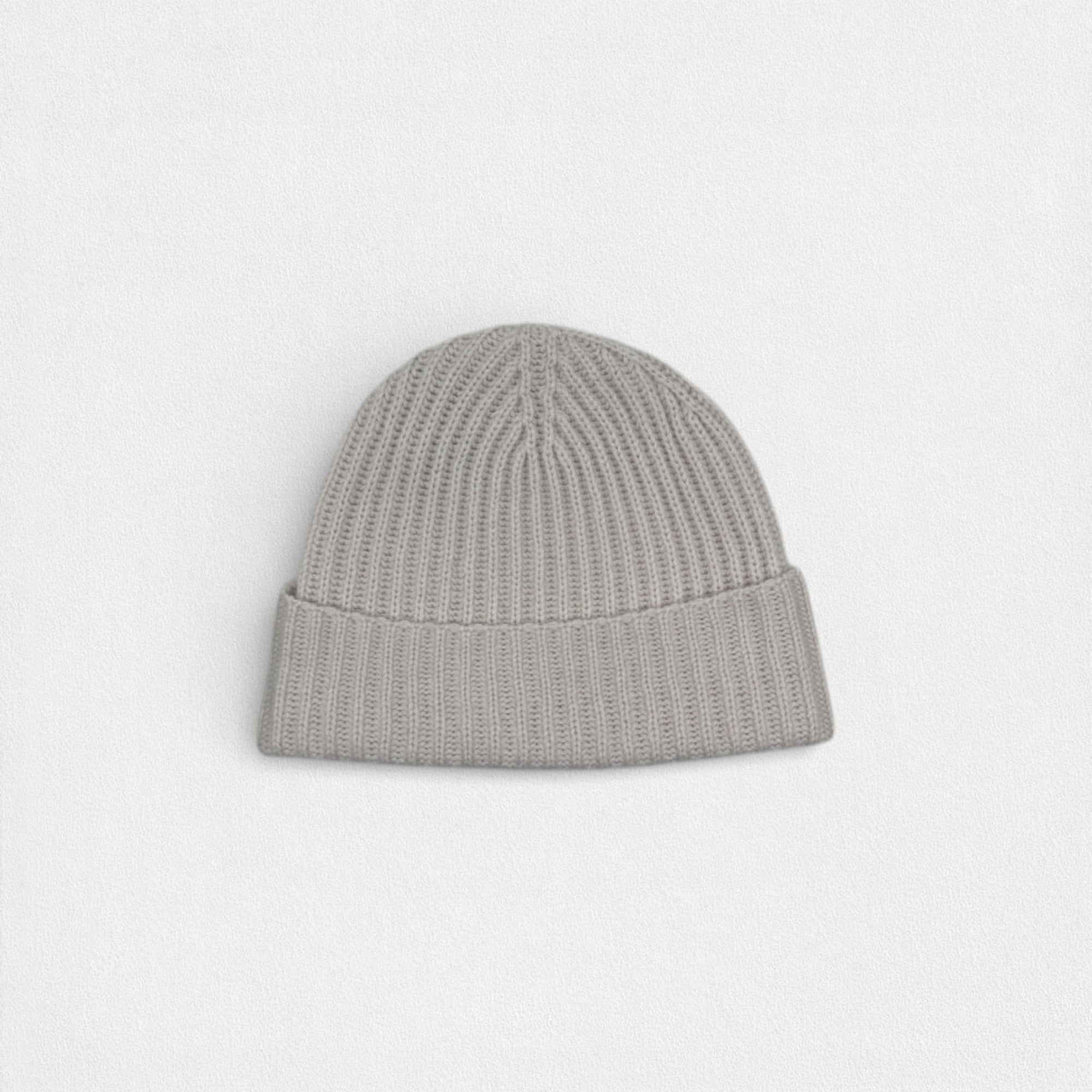 Gray knit beanie on a light gray background