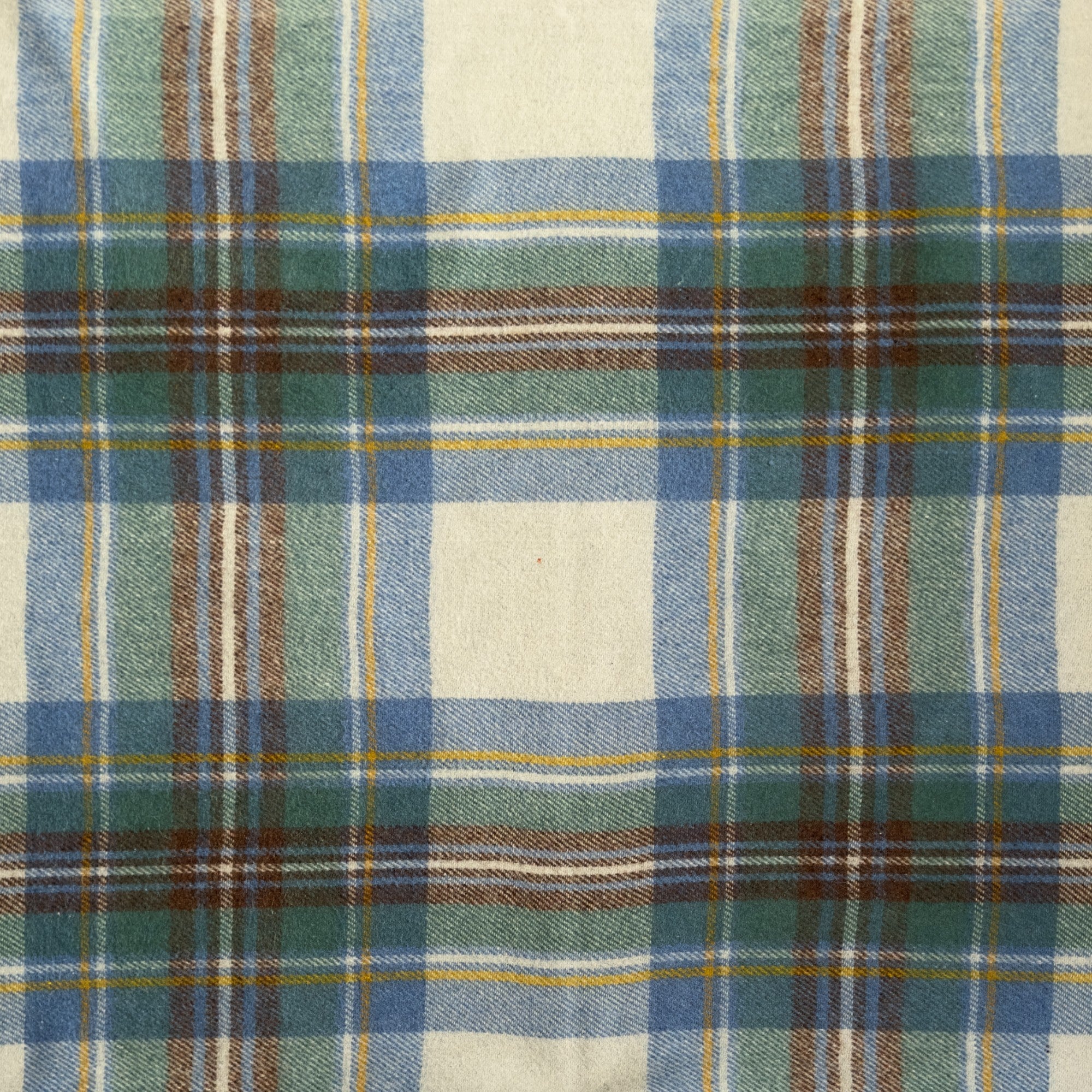 A close up example of the stewart muted blue tartan.