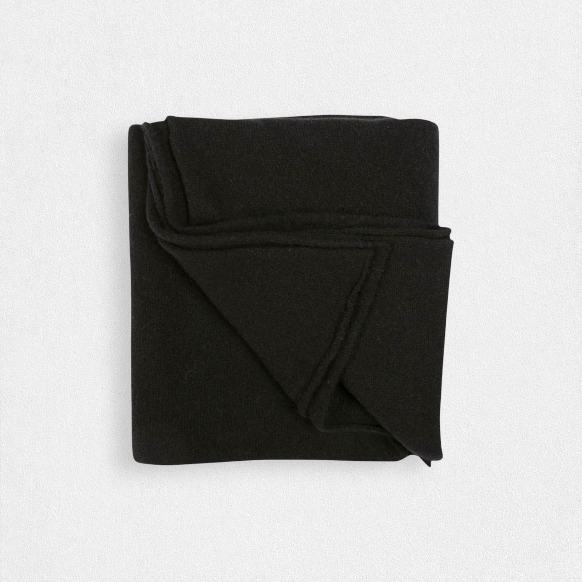 Folded black neck wrap on a white background
